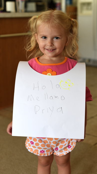 Priya with Spanish banner