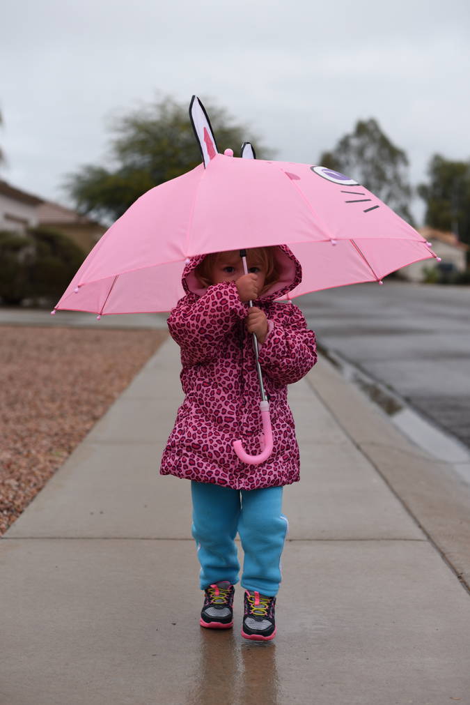 Priya with her pink umbrella