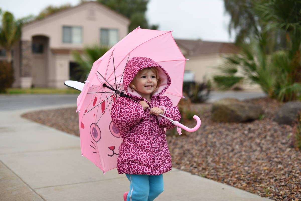 Priya with her pink umbrella