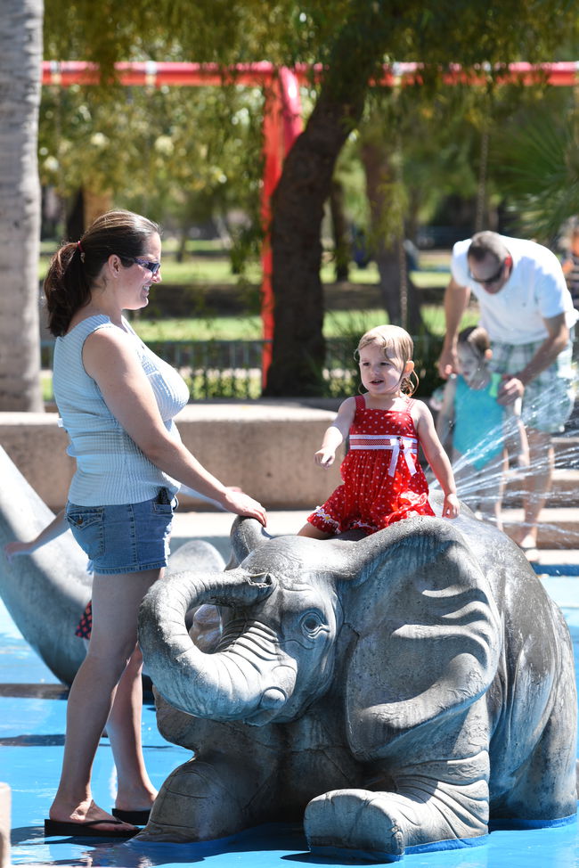 Priya on the elephant at the splash pad